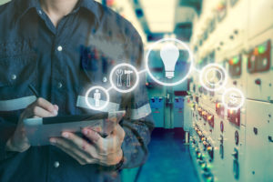 worker on ipad trying to improve material handling